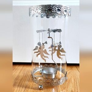 New! Metal Spinning Tealight Holder